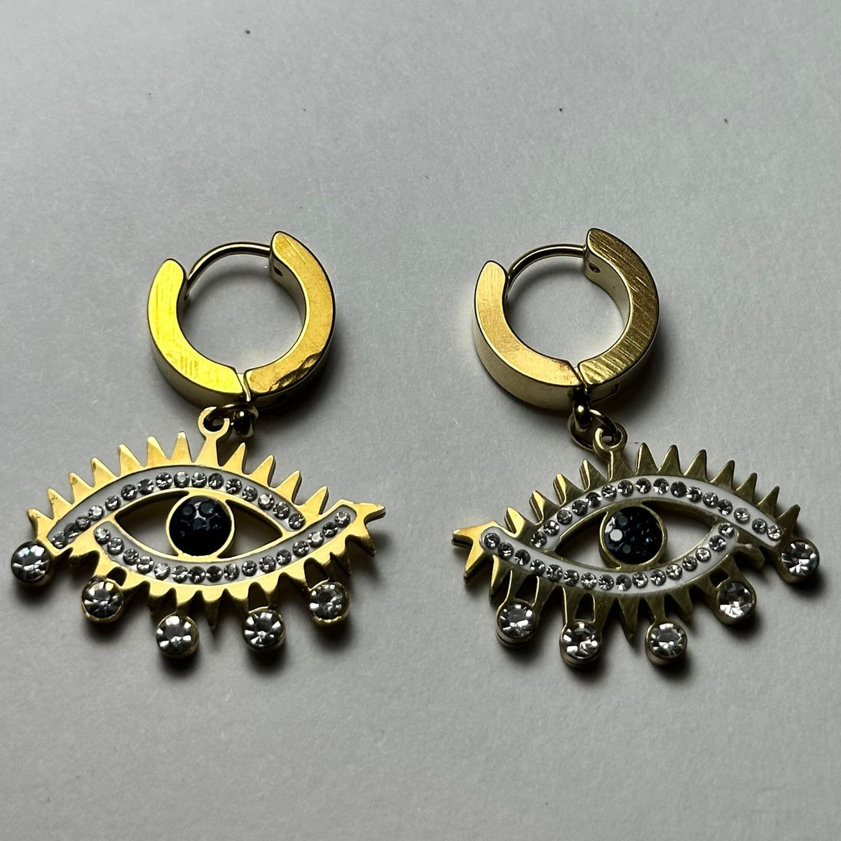 Arete argolla ojo turco.oro