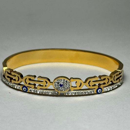 Brazalete ojo turco y piedras blancas.oro