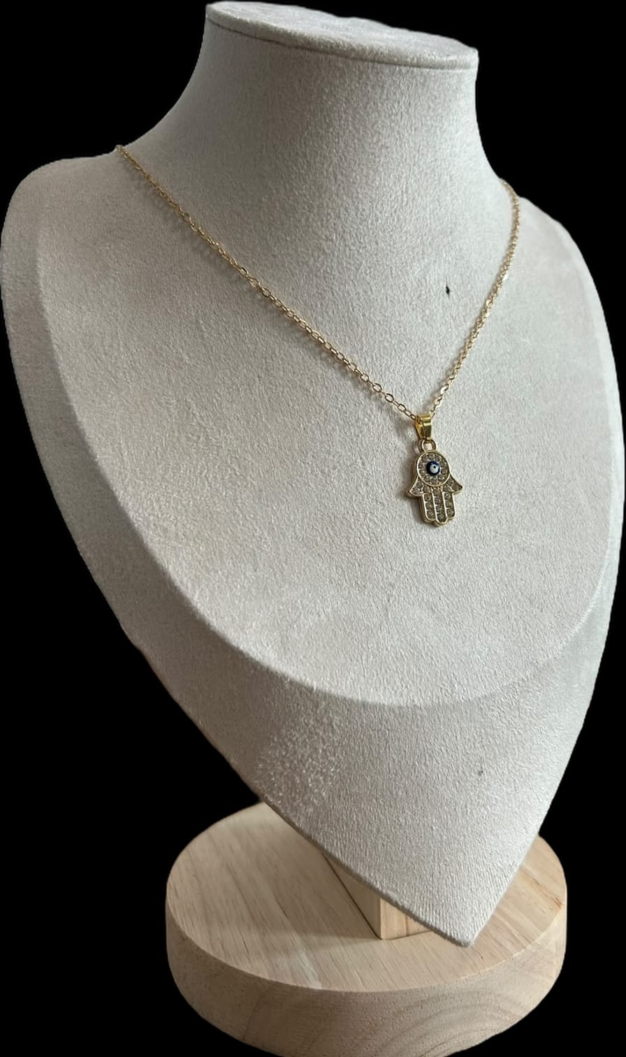Collar pequeño, mano y ojo azul marino.oro