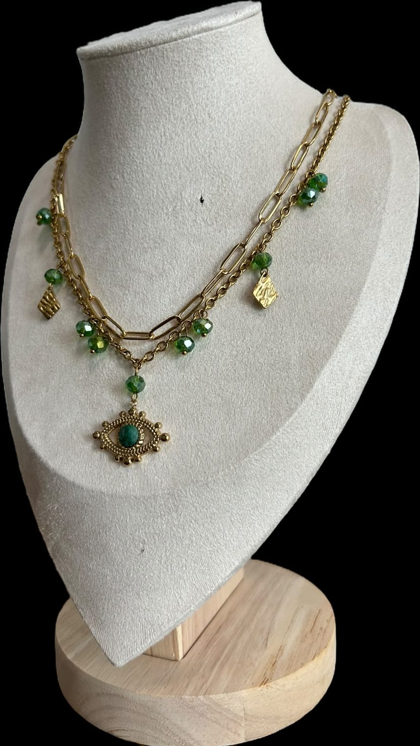 Collar doble, con piedras y ojo verde.oro