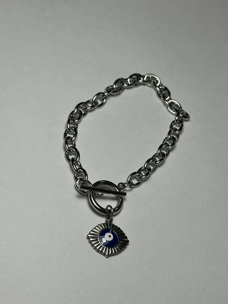 Pulsera eslabón grueso ojo azul marino.plata