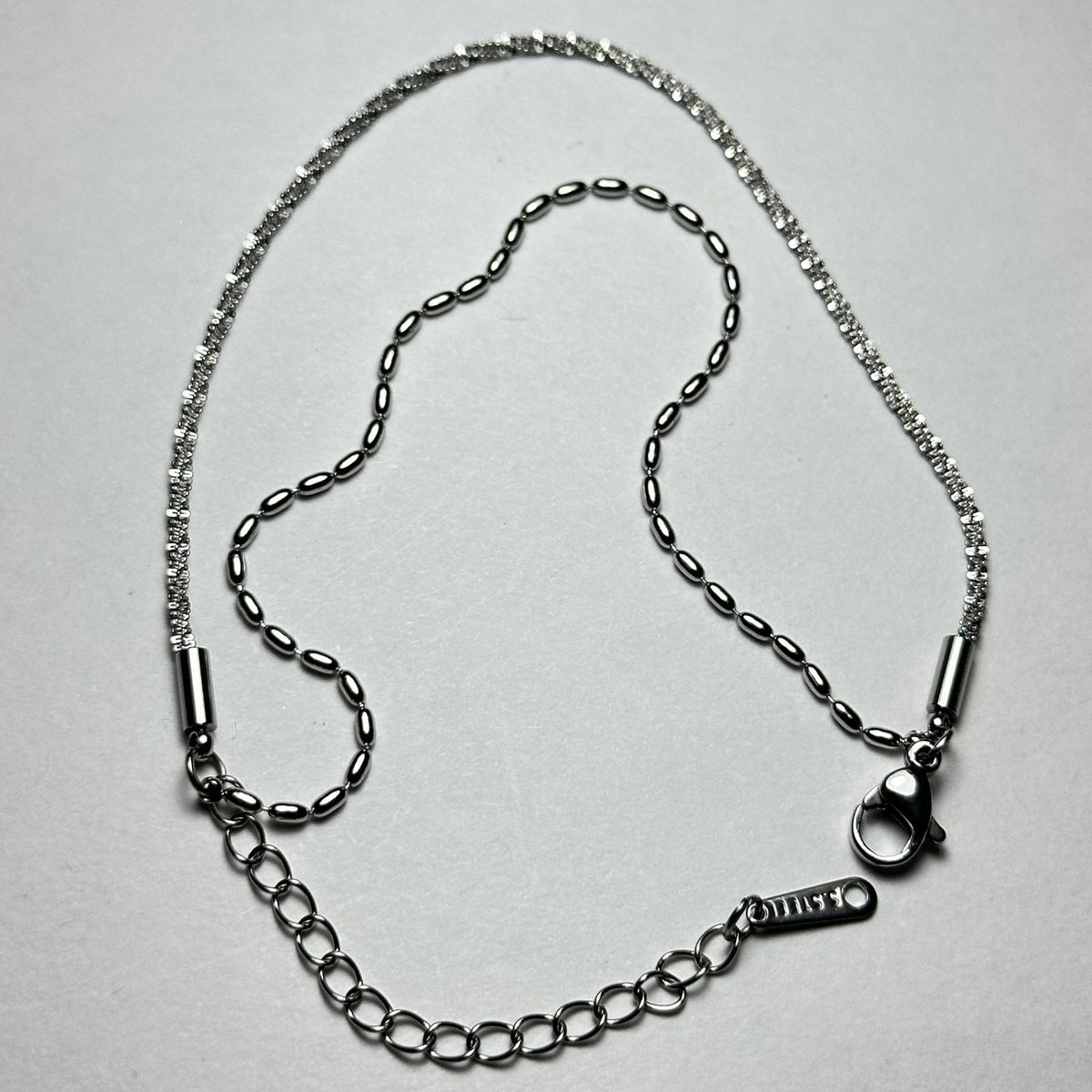 Pulsera doble torsal y bolitas.plata