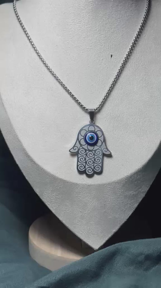 Collar mano con ojo.plata